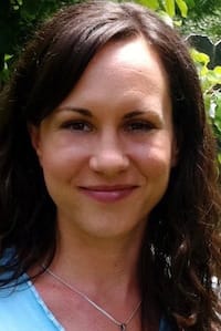 Emilie Graham's headshot standing outdoors